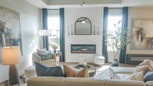 bright living room with two small windows