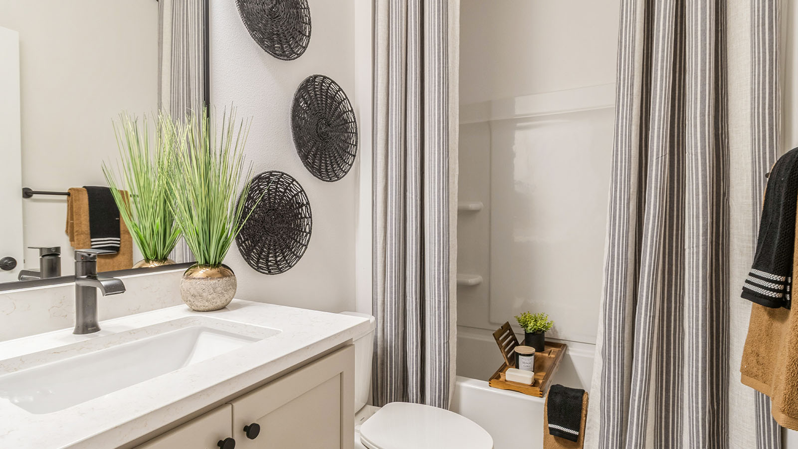 second bathroom with sink and shower and bathtub