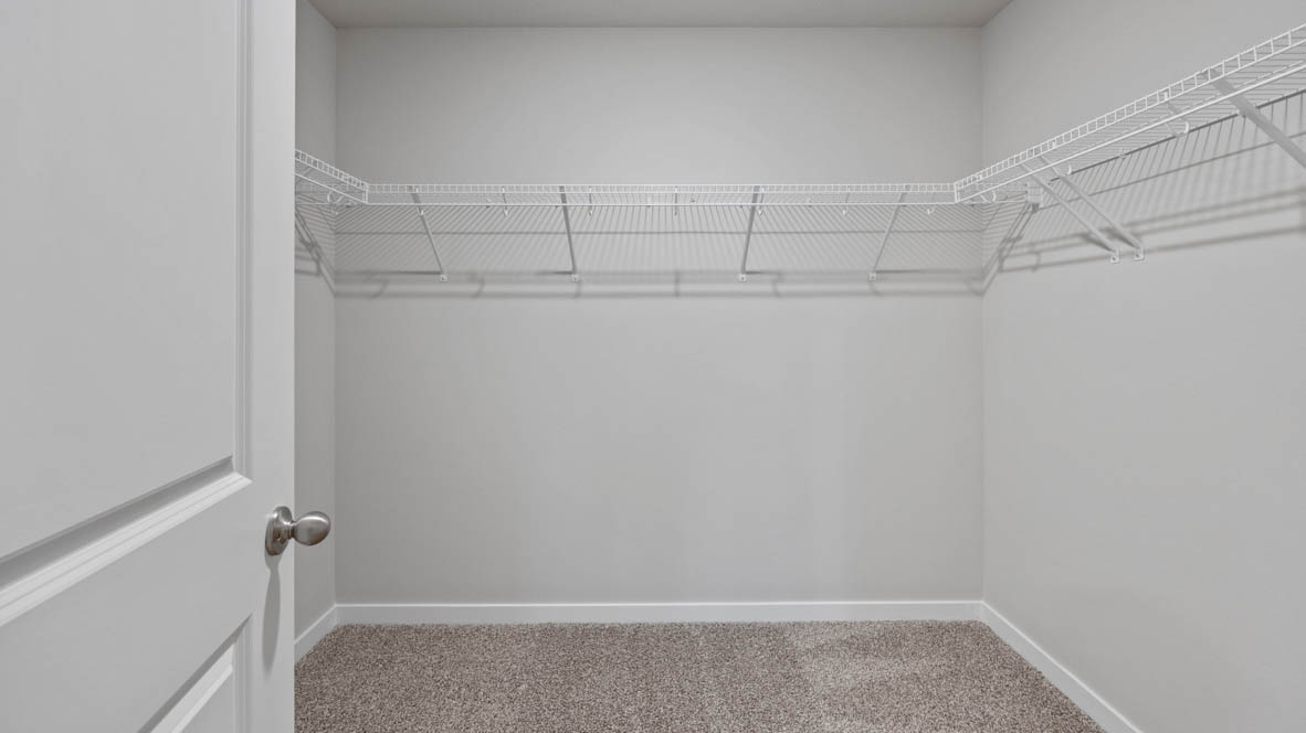 Walk in closet off primary bathroom