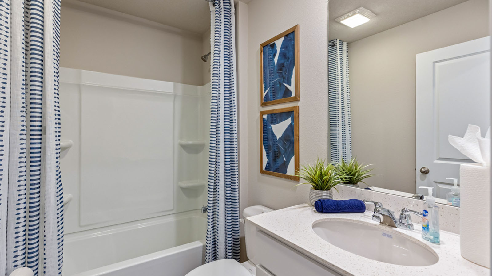 Second full bathroom with sink and bathtub