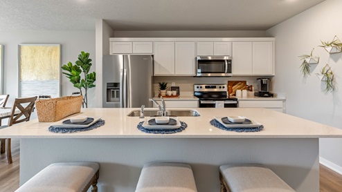 Kitchen with stainless-steel appliances