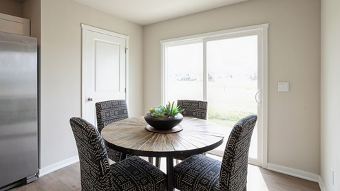 Dining area next to sliding glass doors