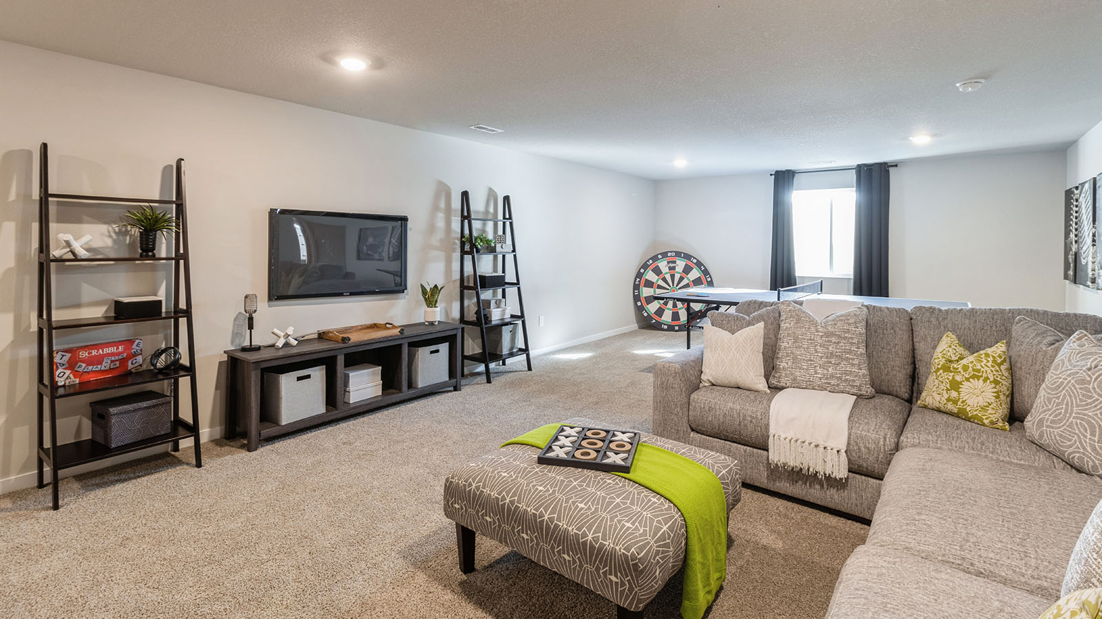 Basement game room with recessed lighting and flexible space for entertainment or relaxation at Highland Meadows