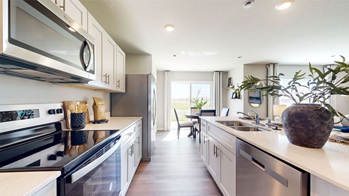 Kitchen with stainless-steel appliances