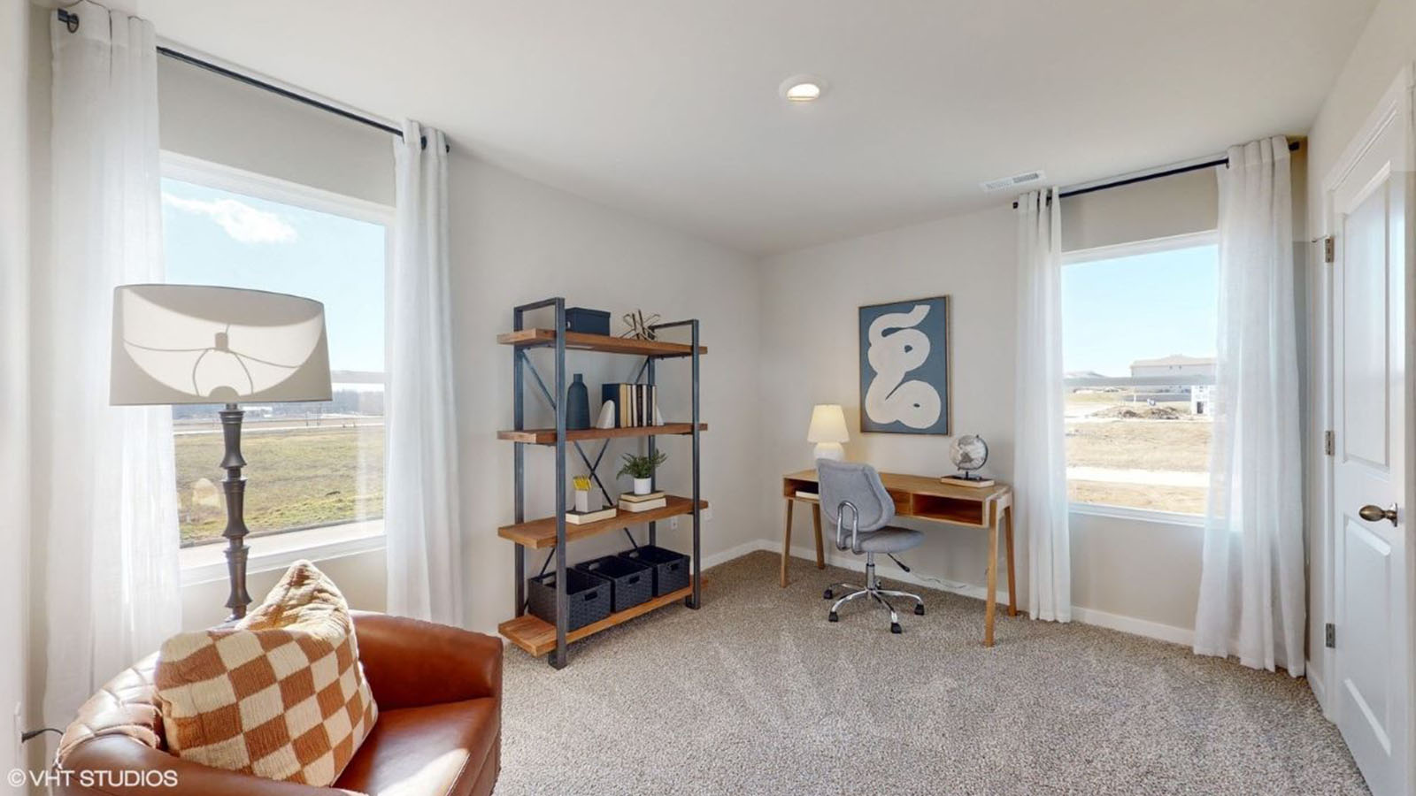 Secondary Bedroom offers well-designed flexibility—ideal for sleeping space, home office, or a fun hobby room