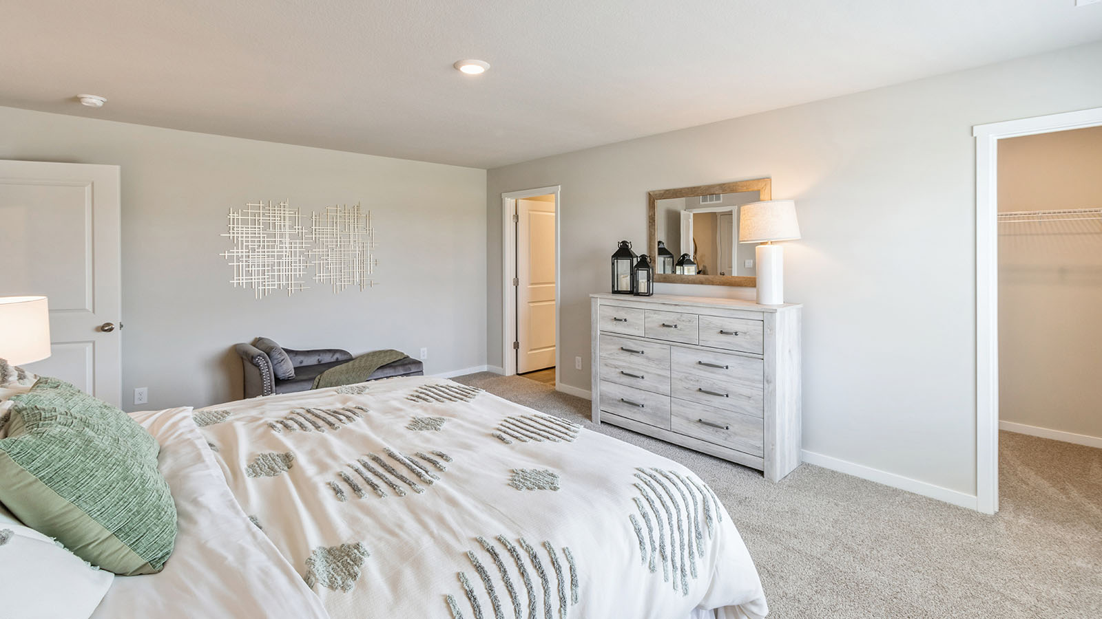 D.R. Horton’s New Townhome features a calm, functional primary bedroom, walk-in closet, en-suite bath with recessed lighting