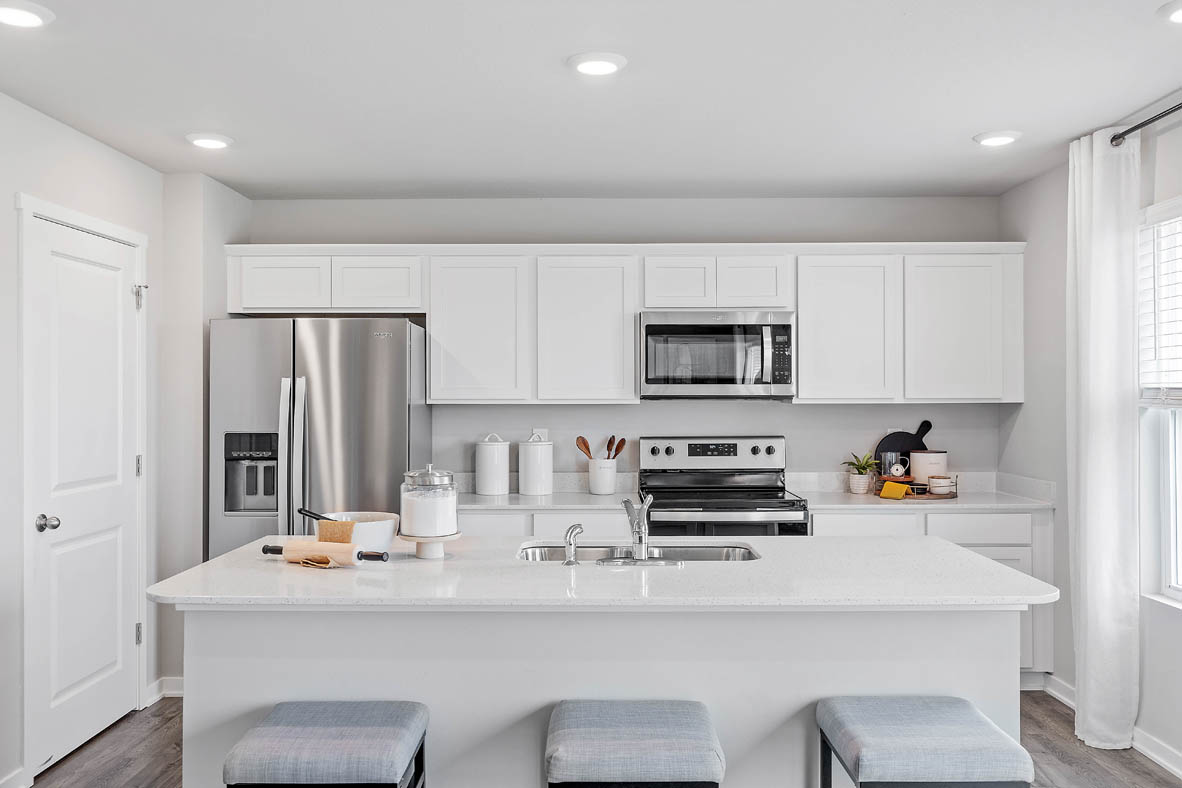 kitchen with white cabinets and stainless-steel appliances