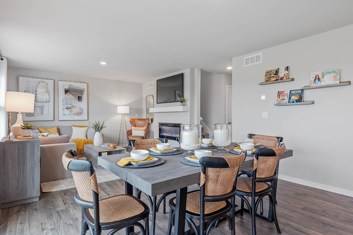 wood dining room table overlooking living room