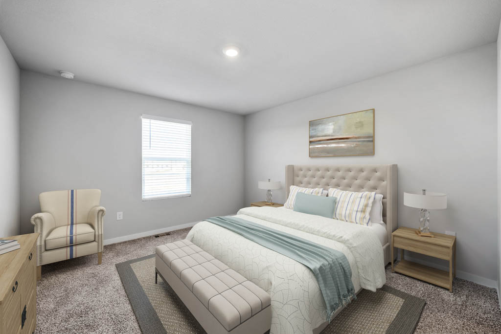 primary bedroom with large window