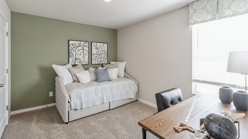 Second bedroom with small bed and desk with chair