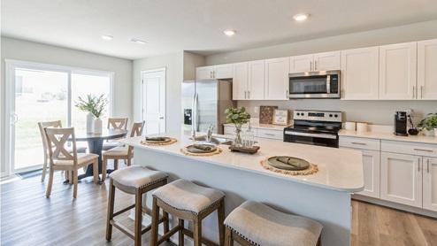 Modern kitchen with view of dining area
