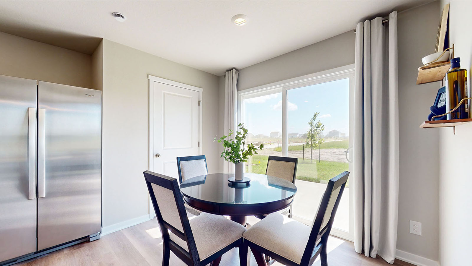 dining area next to sliding glass doors