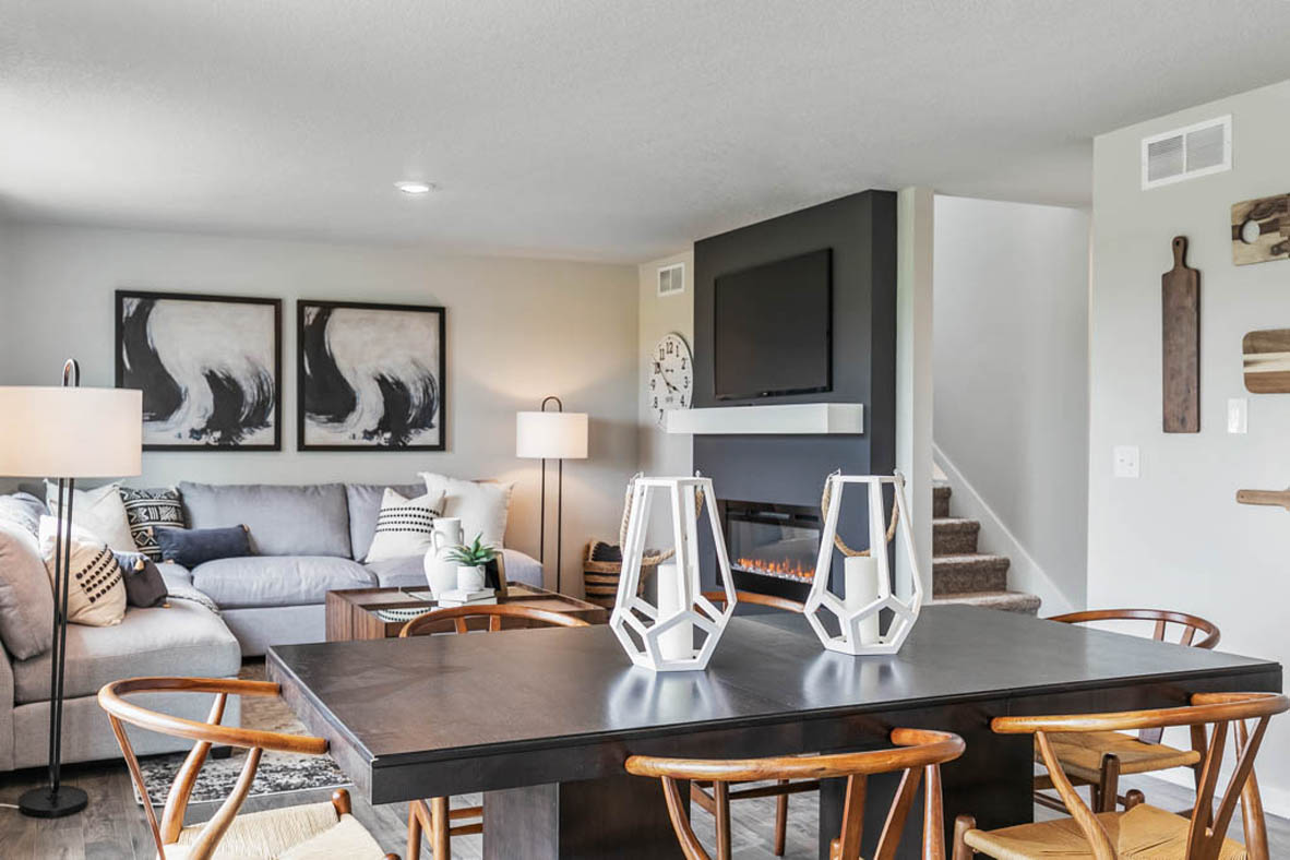 View of the dining area with a six-seater table overlooking the living room.