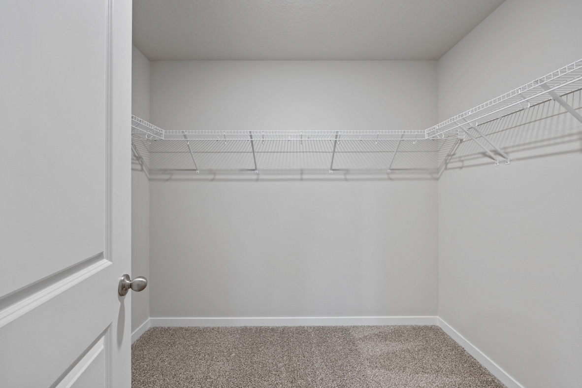 Large, walk-in closet off of the primary bathroom.