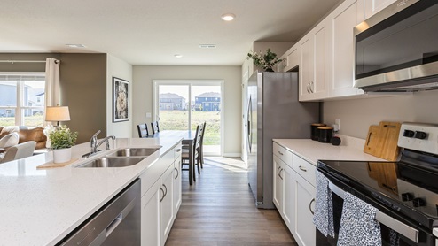 Side view of kitchen next to glass sliding doors