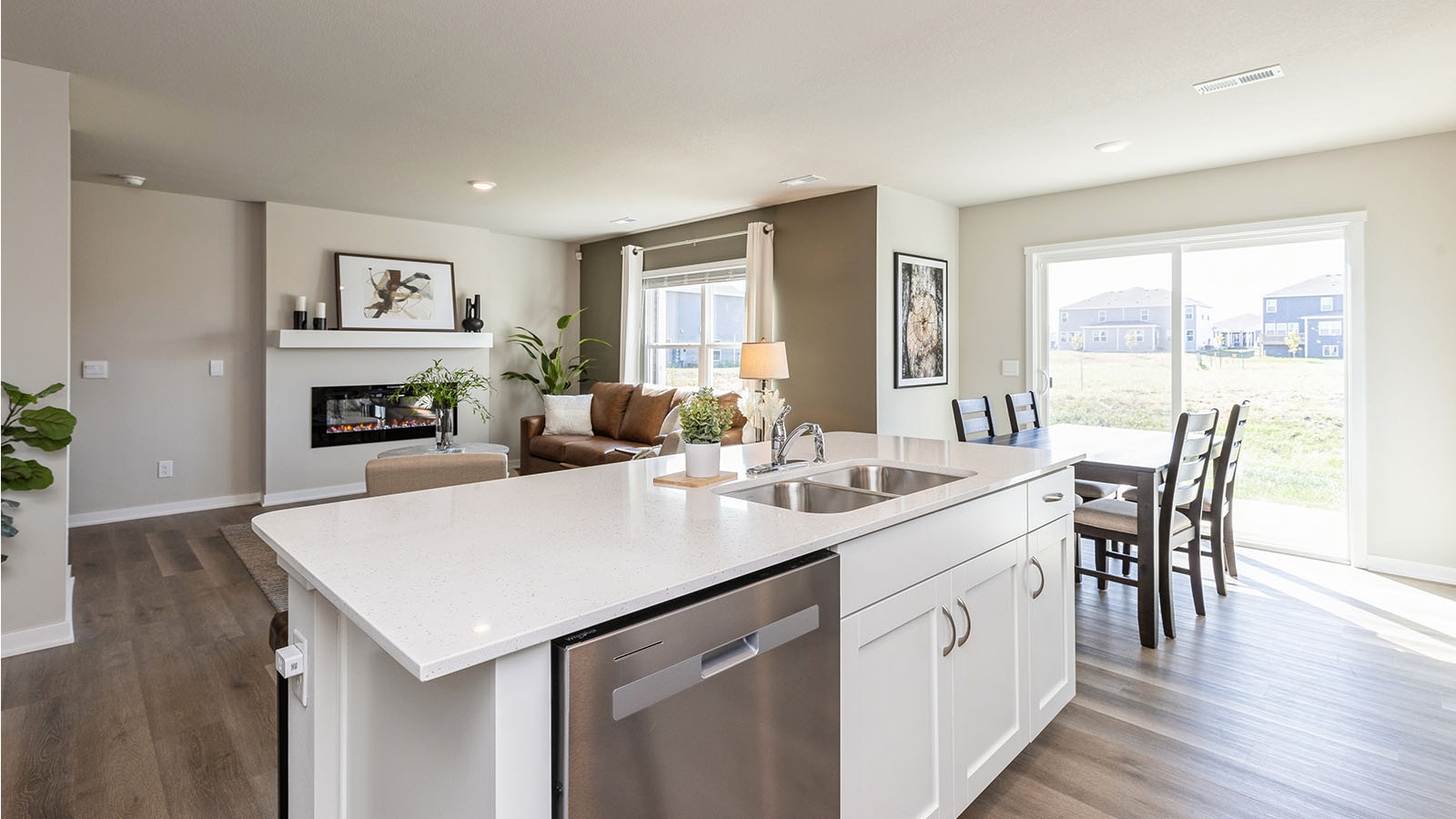 Kitchen island overlooking living room and dining area