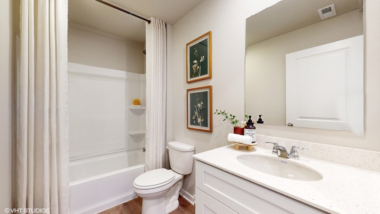 Second bathroom with shower and bathtub