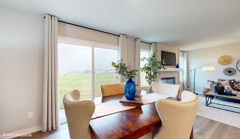 dining room table next to sliding glass doors