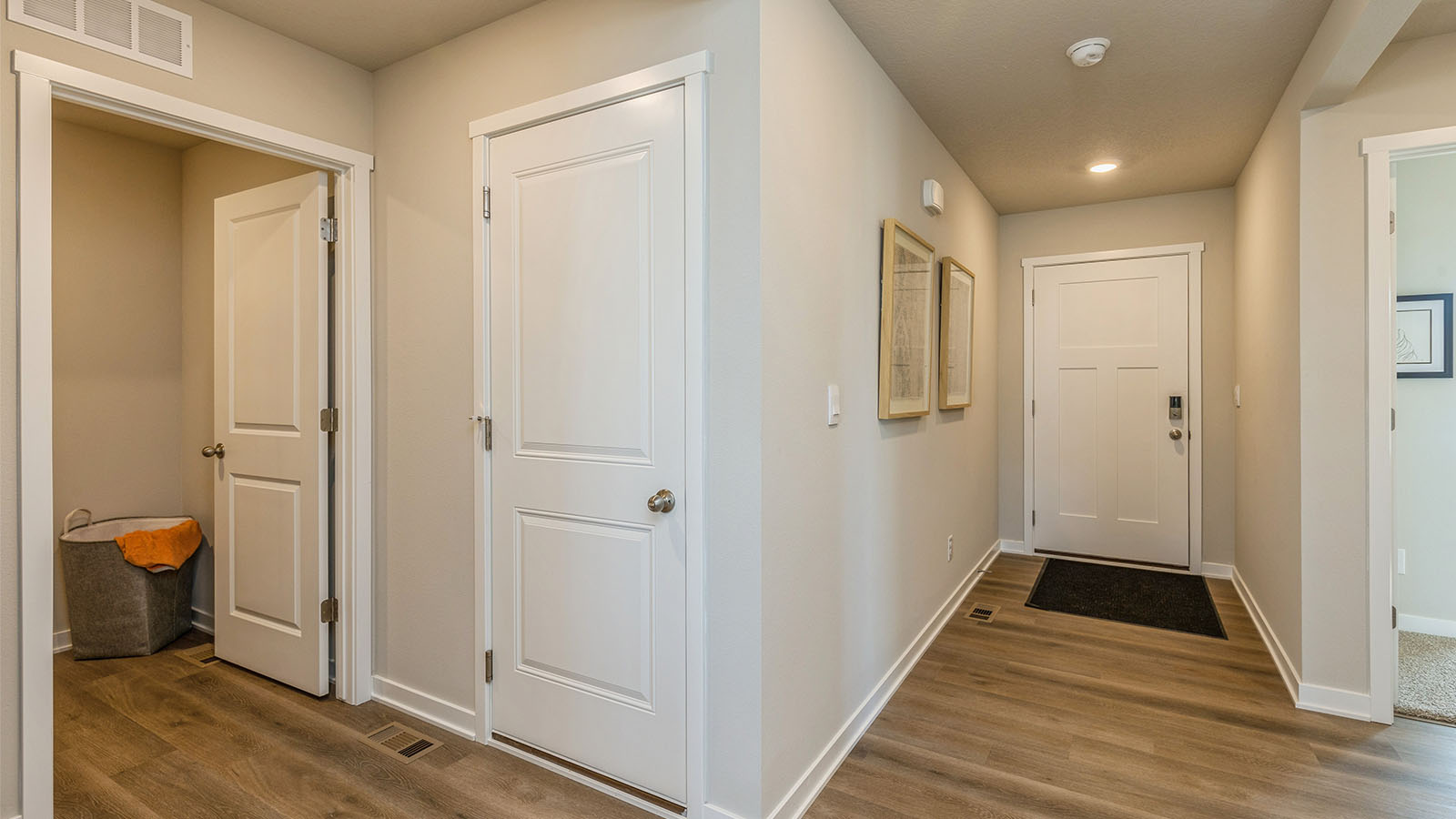 Front entryway of home with view of front door.