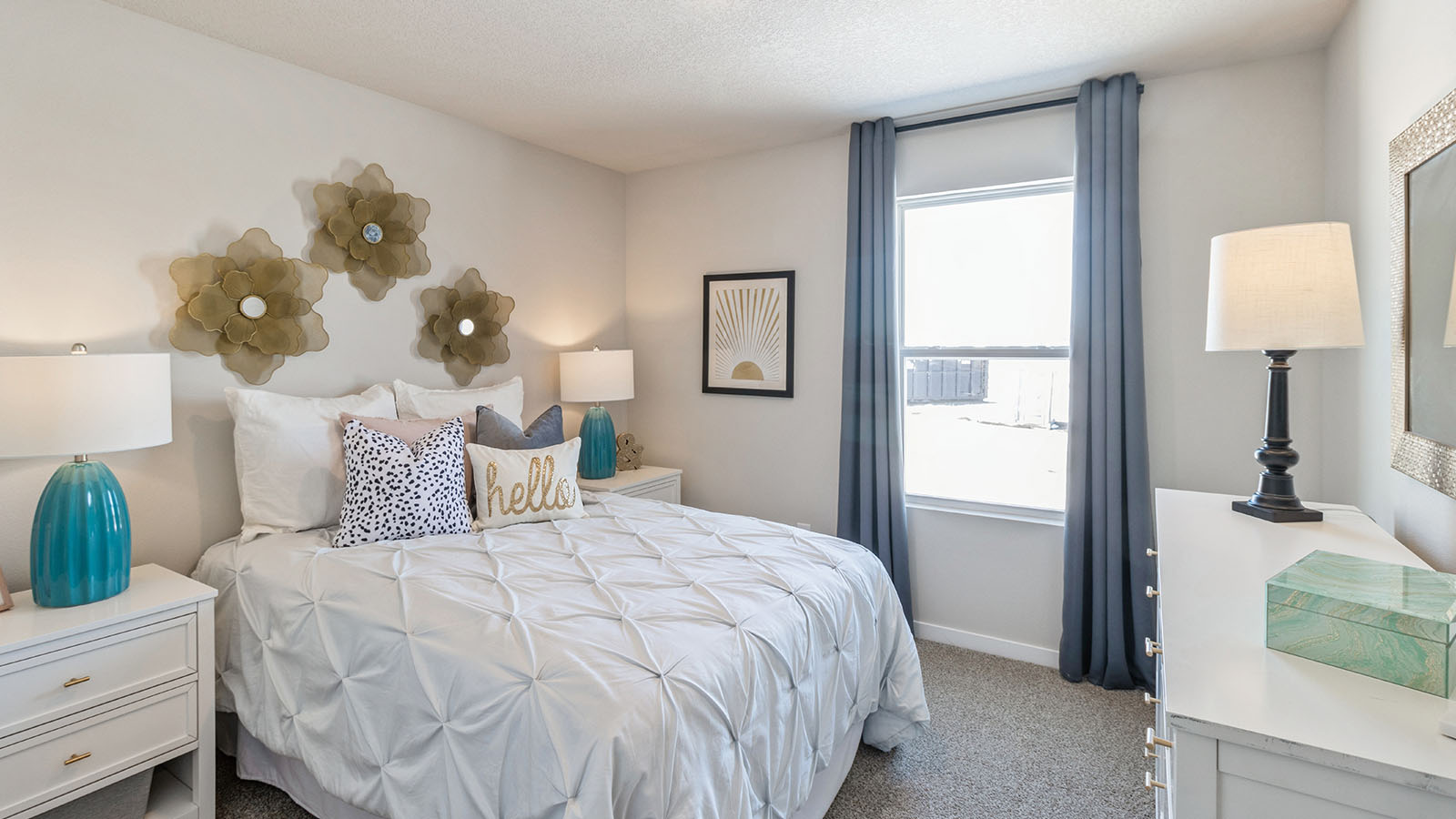 Second bedroom with white bed and white nightstands