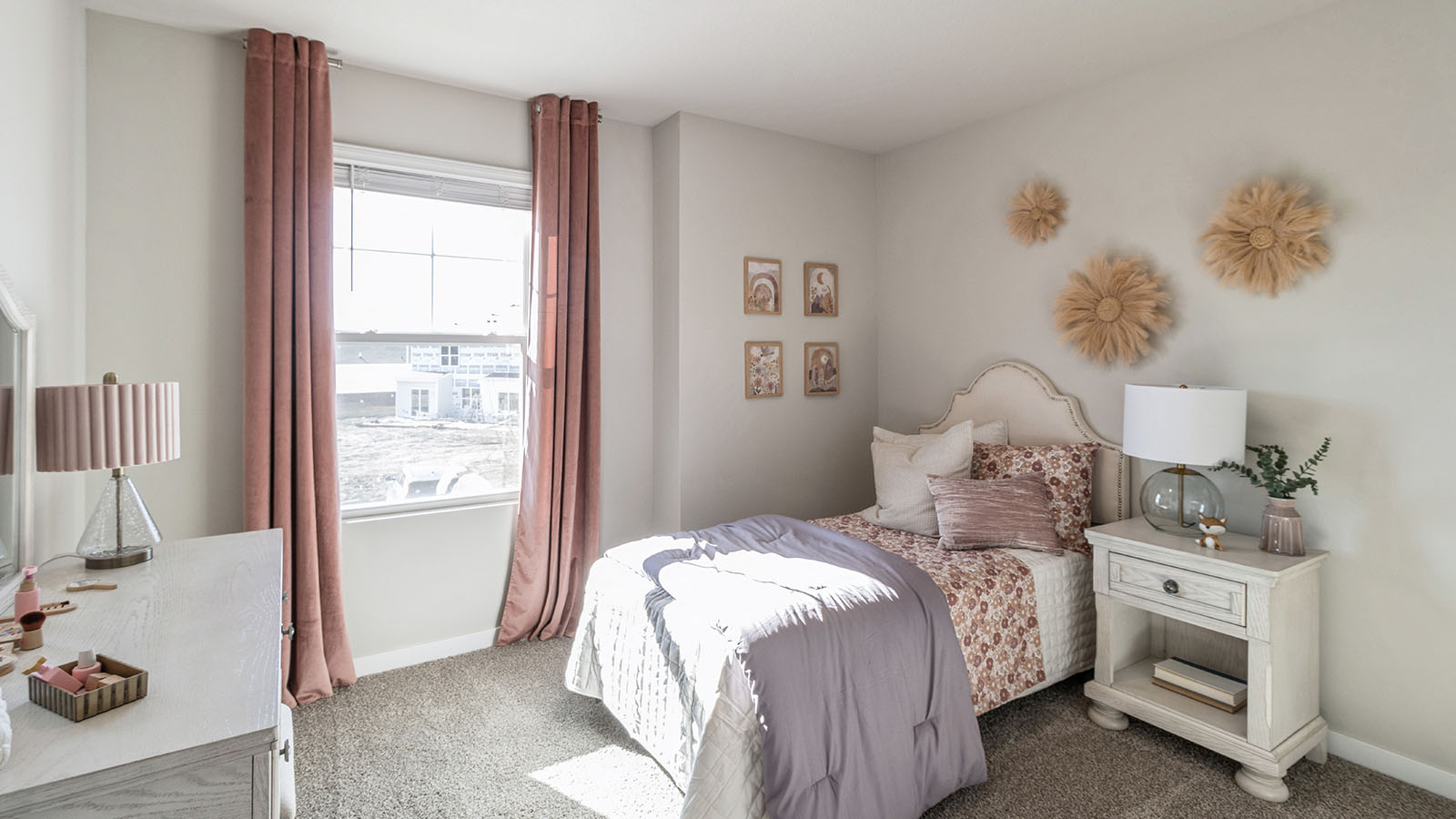 Bedroom with carpeted floors and a window.