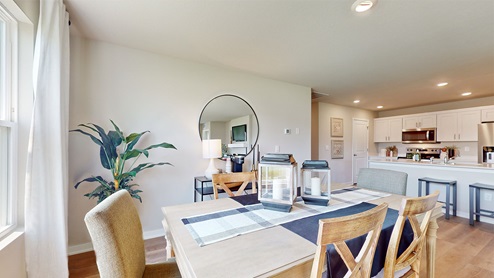 Dining room table overlooking kitchen