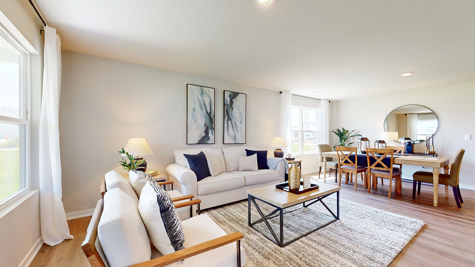 Open concept floor plan featuring living and dining room.