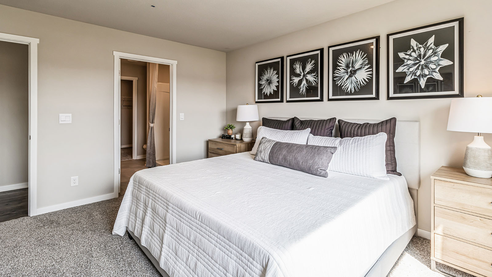 Primary bedroom designed for privacy and style adding a spa-inspired ensuite bathroom and walk-in closet Three Lakes