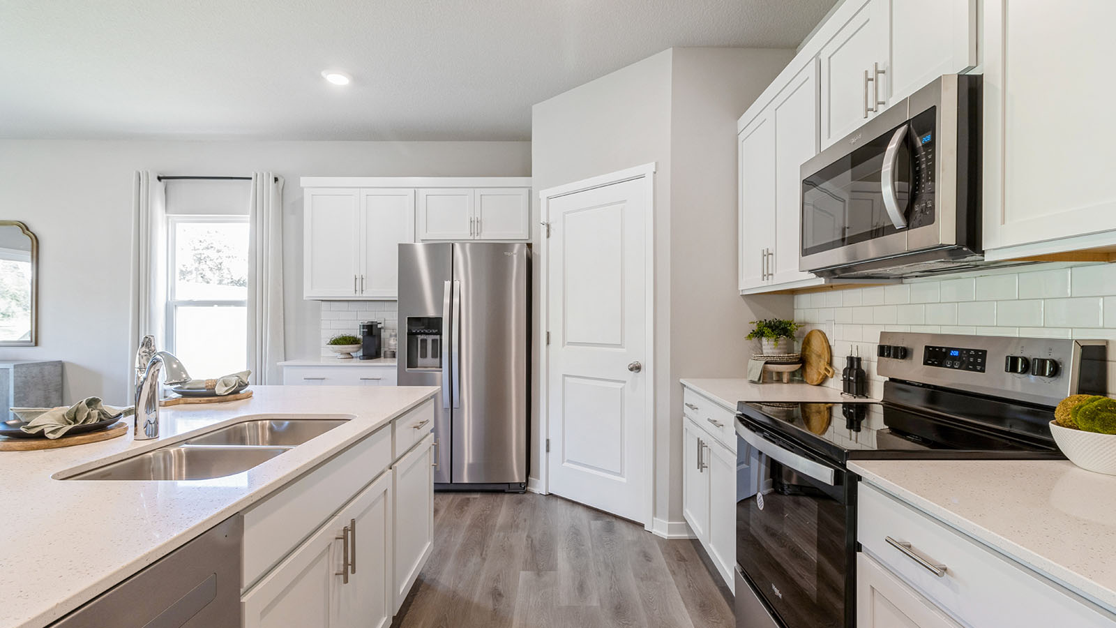 Kitchen with walk in pantry.