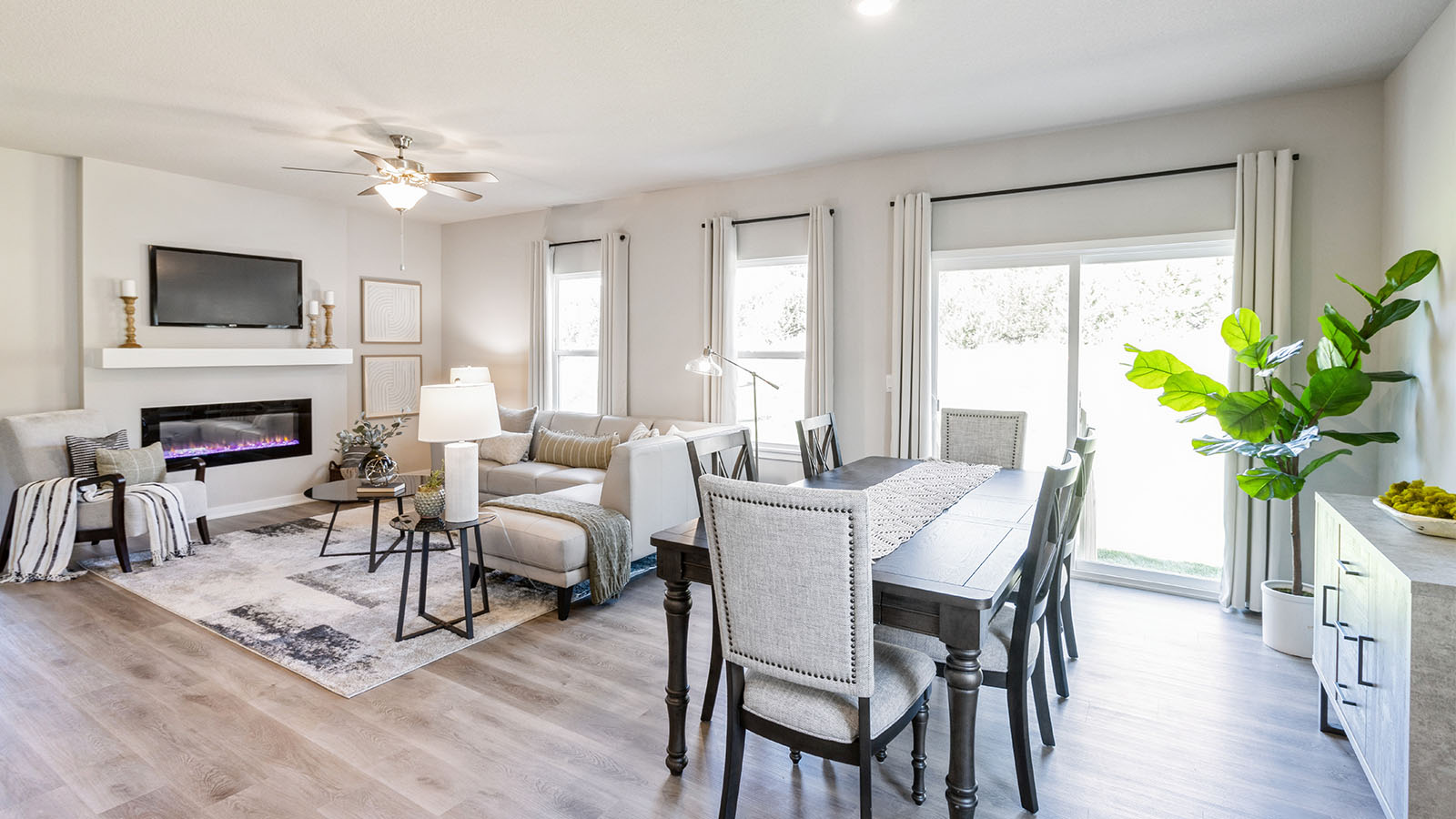 Open concept floorplan with views of dining area and living room.