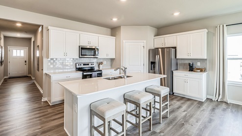 kitchen with stainless-steel appliances and quartz countertops