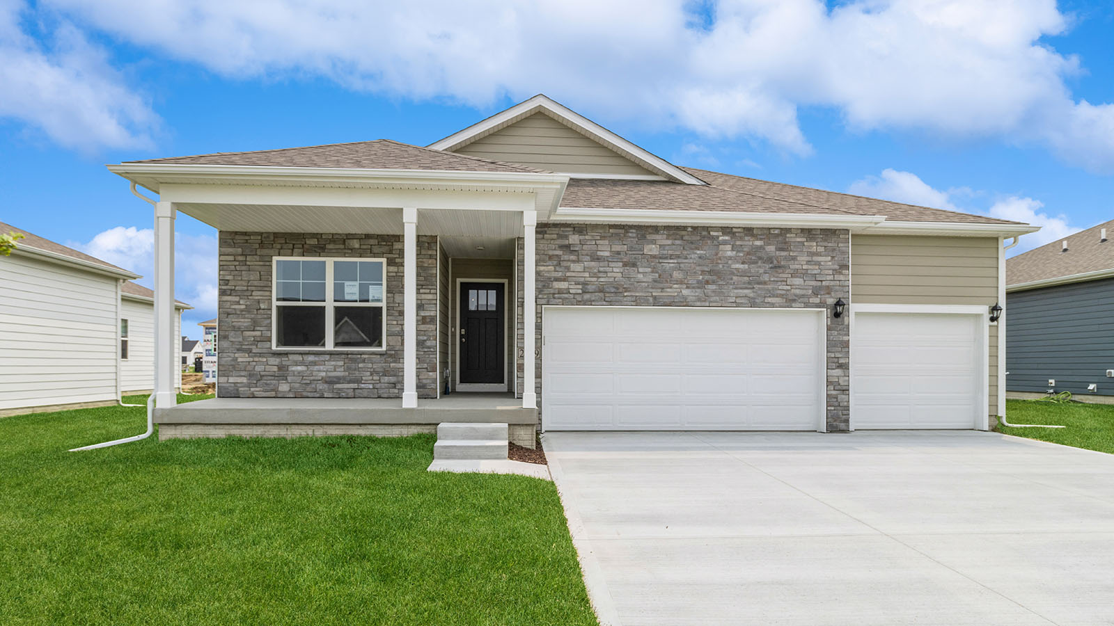 front exterior of fairfield home with 3 car garage