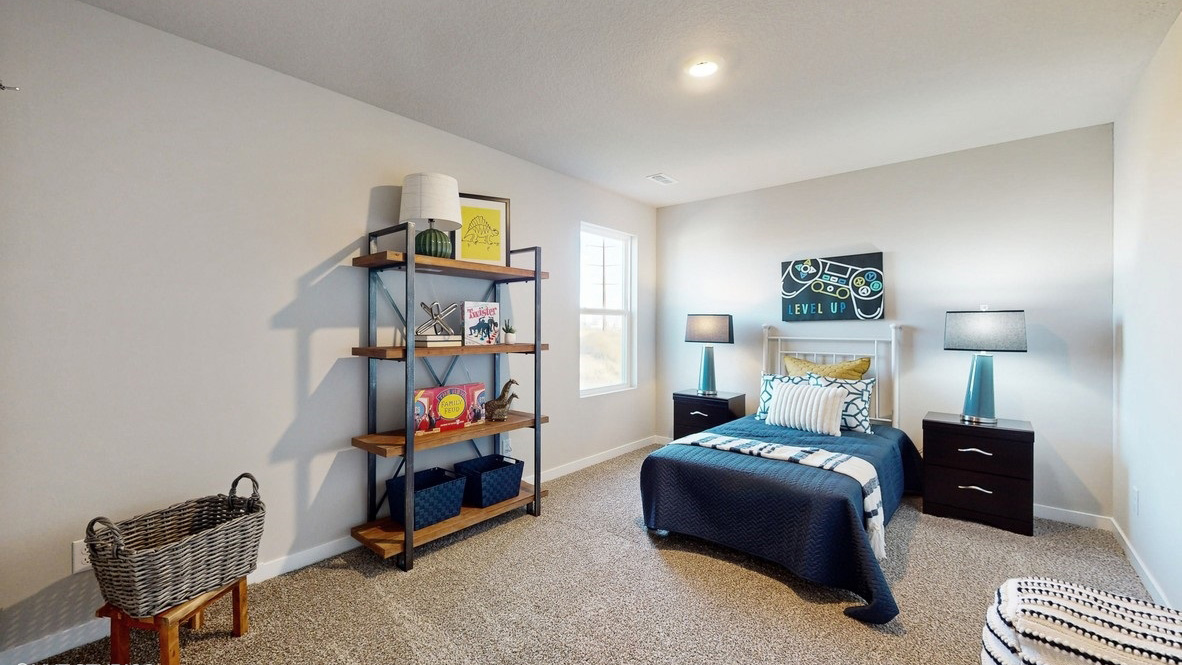 Third bedroom with blue bed and nightstands