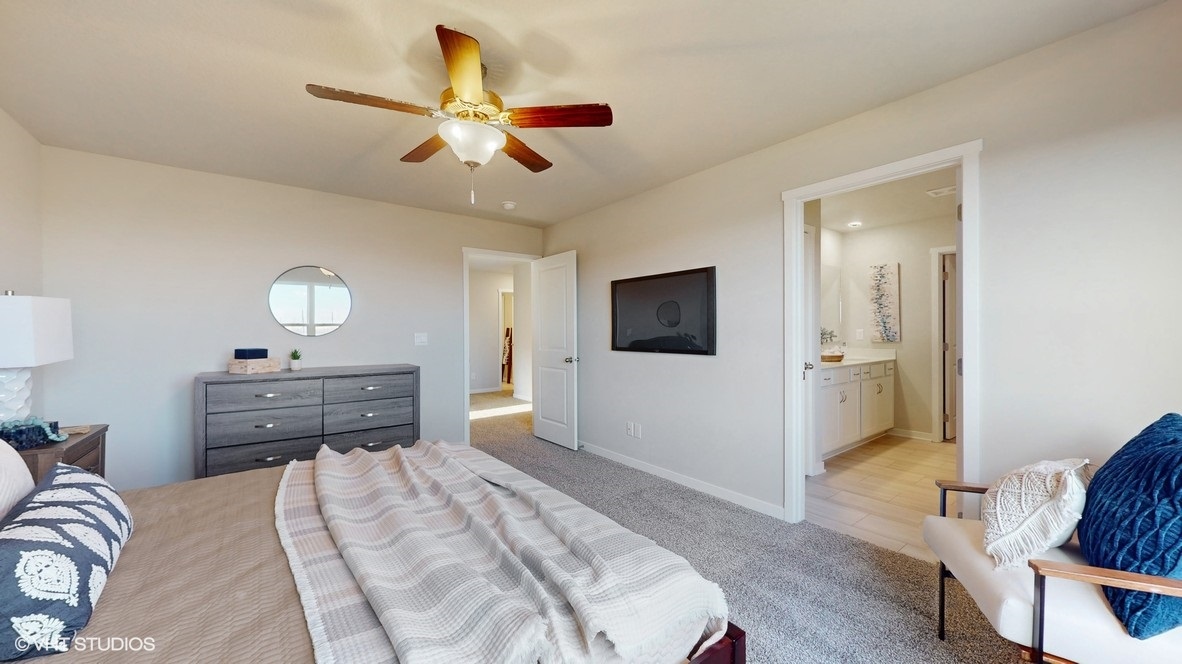 Primary bedroom showing primary bathroom