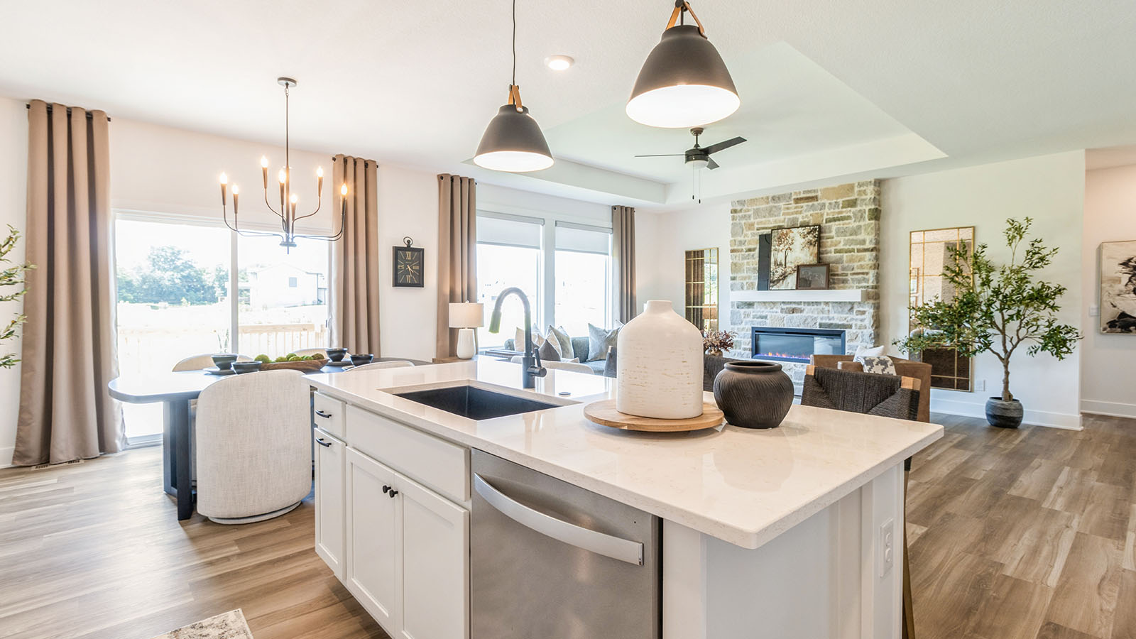 Kitchen island overlooking big living room and dining area