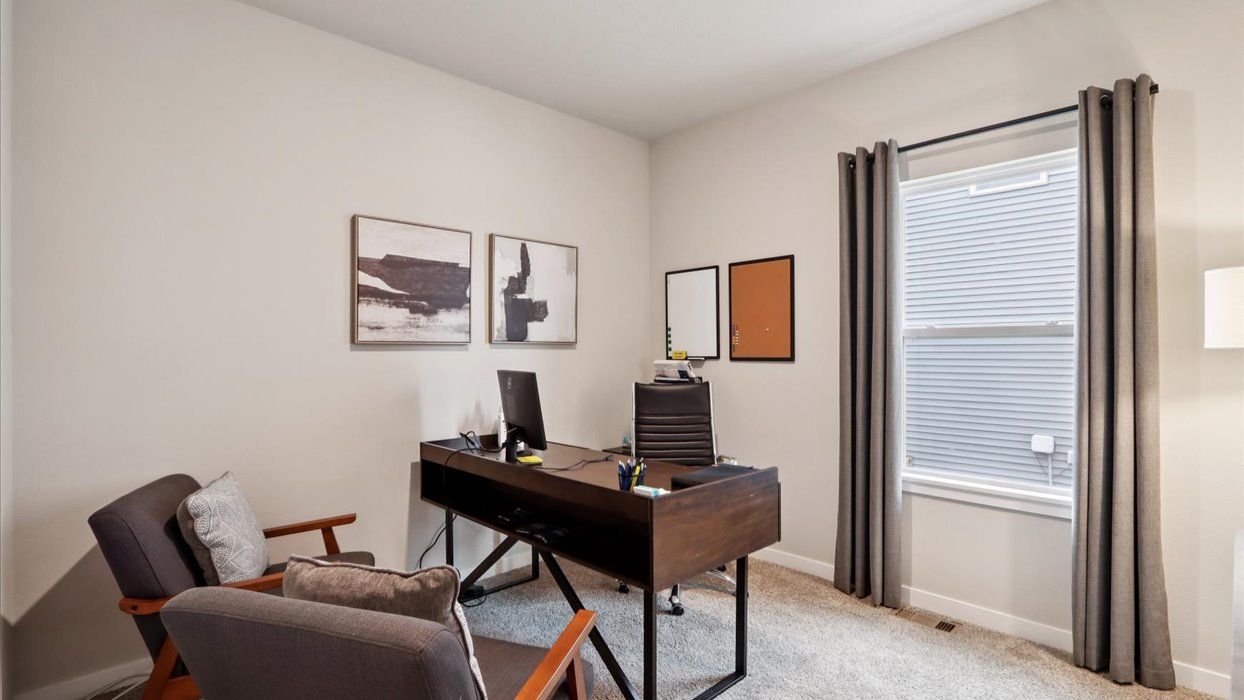 Comfortable secondary bedroom with natural light, modern finishes, and versatile living space.