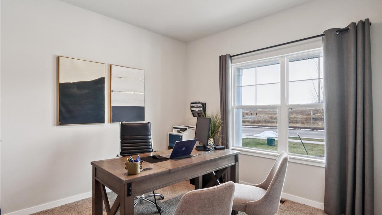 Comfortable secondary bedroom with natural light, modern finishes, and versatile living space.