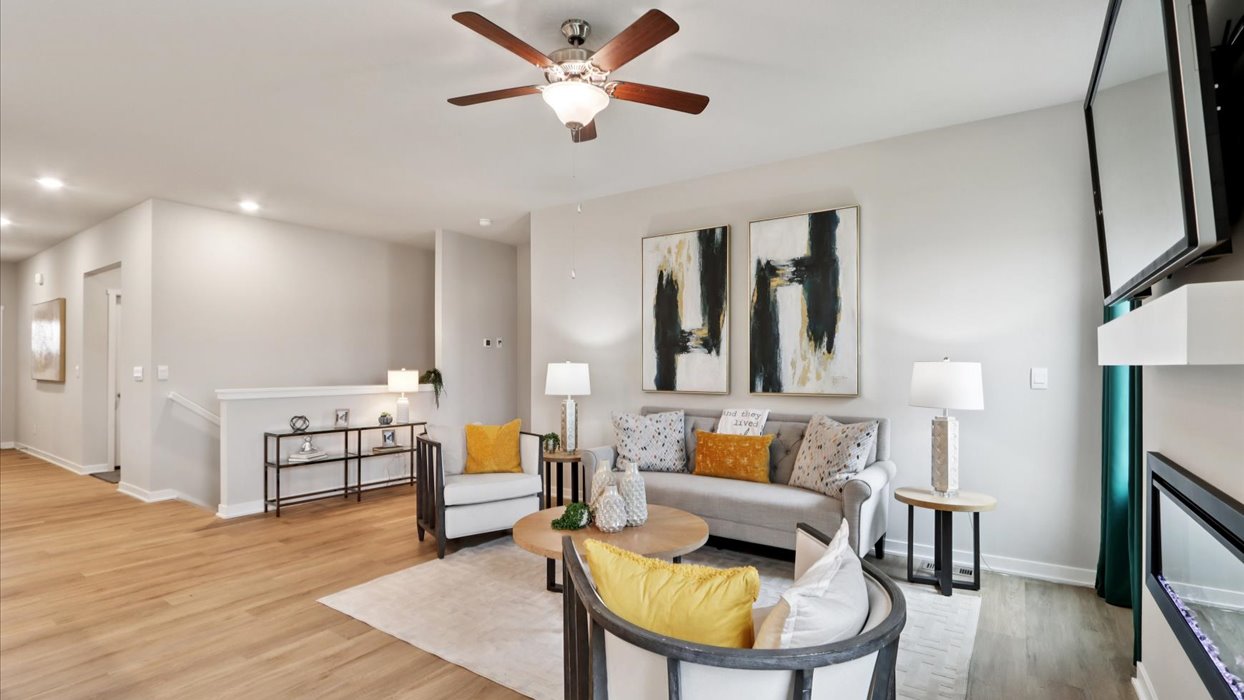 Open concept living room with electric fireplace