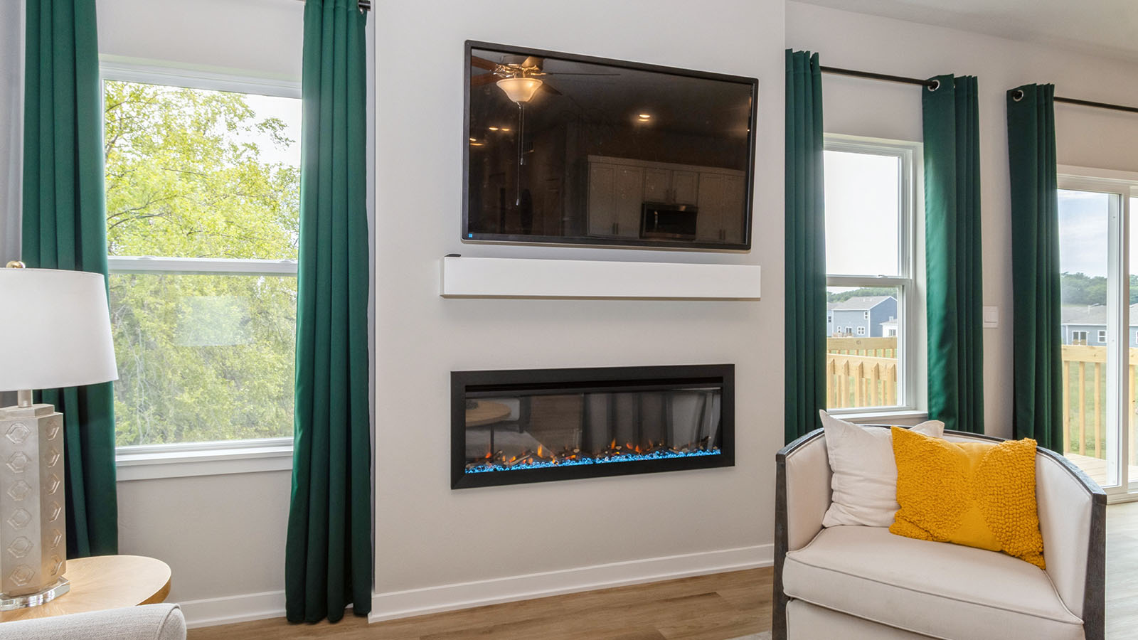 Open concept living room with electric fireplace