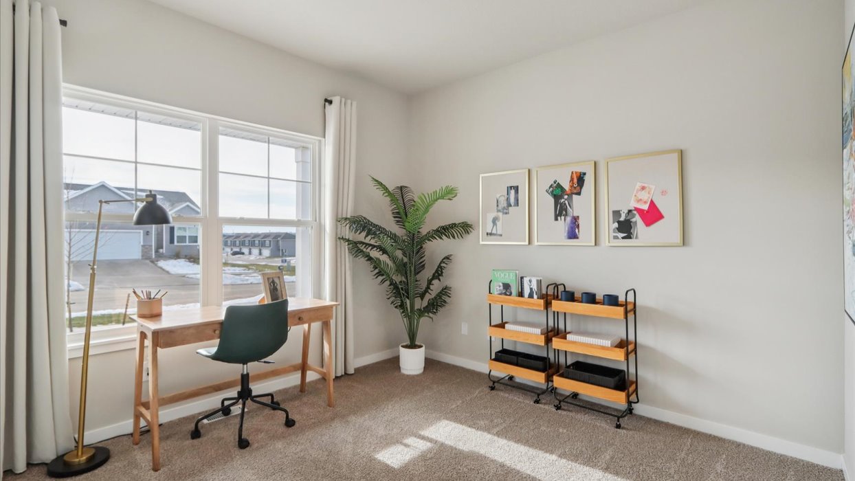 Comfortable secondary bedroom with natural light, modern finishes, and versatile living space.