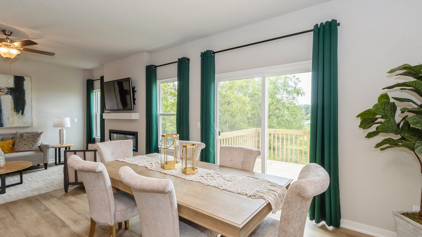 large wood dining room table next  to sliding glass doors