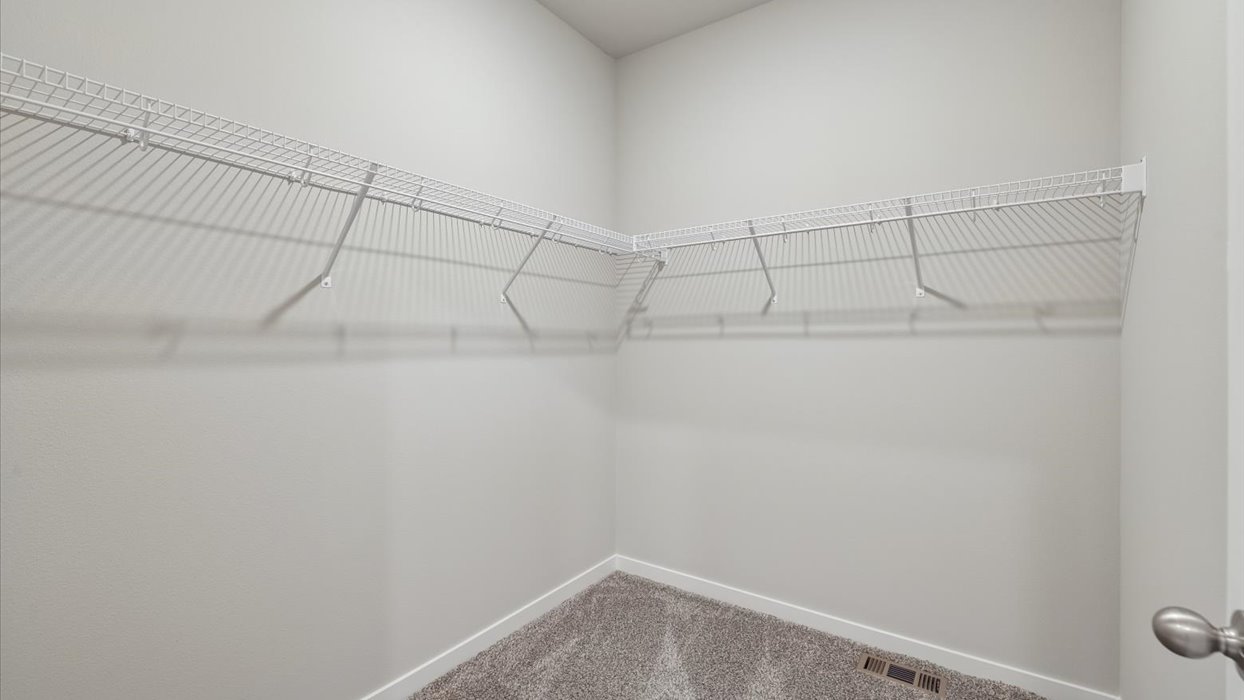 Spacious walk-in closet offering ample room for clothing, accessories, and everyday essentials.