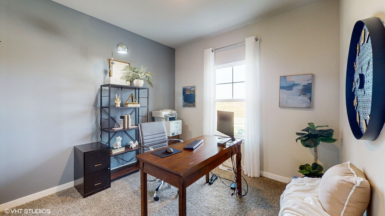 Second bedroom in the Roland staged as an office