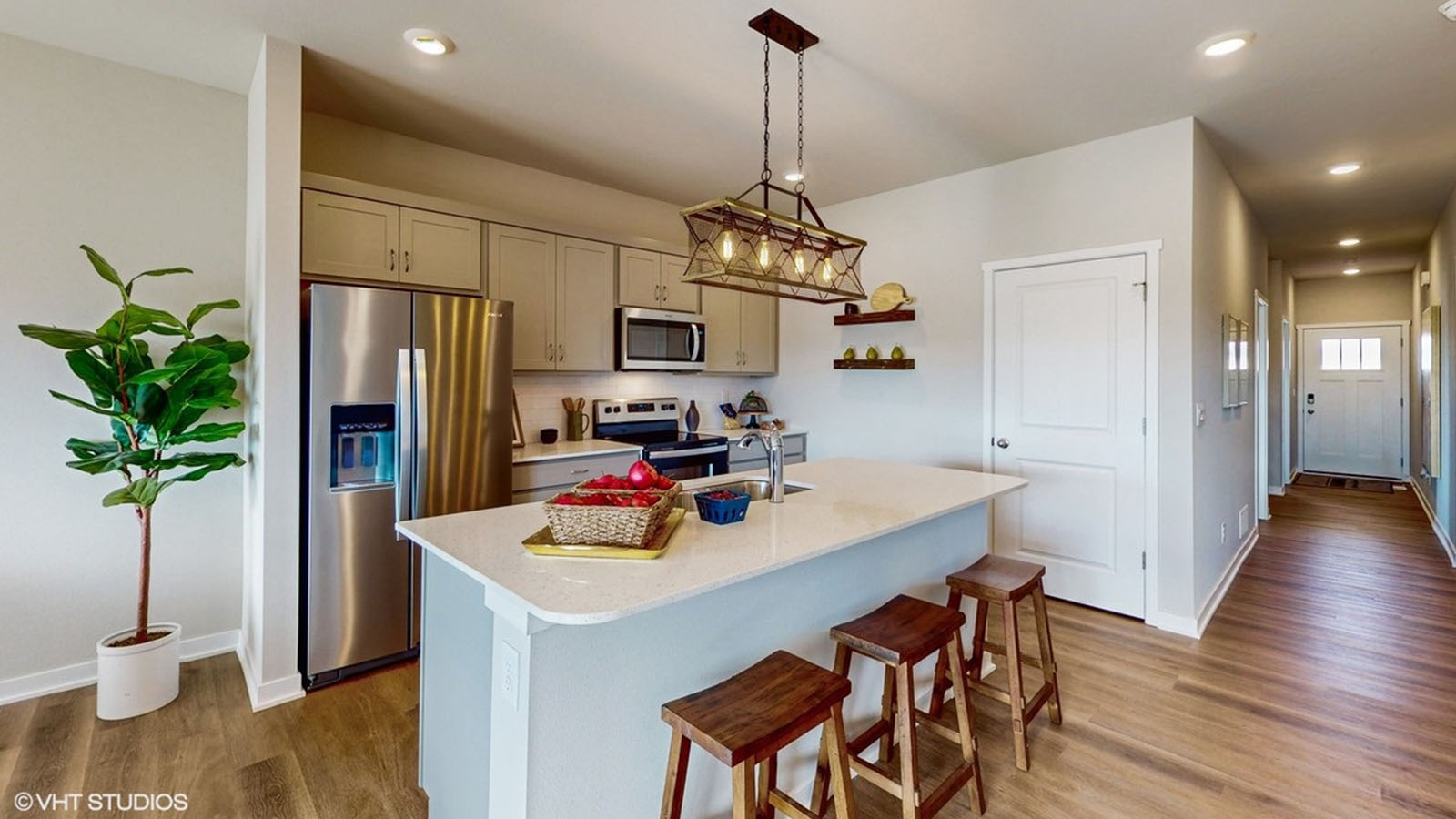 Roland Kitchen with a big island that can seat 3