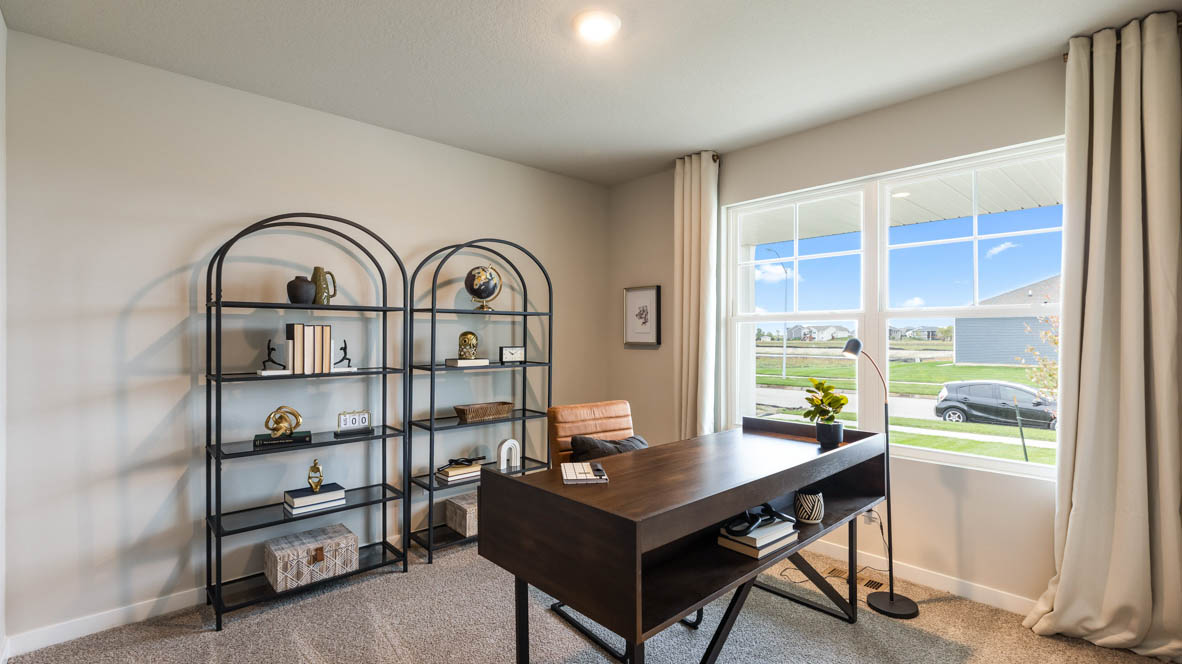 Comfortable secondary bedroom with natural light, modern finishes, and versatile living space.