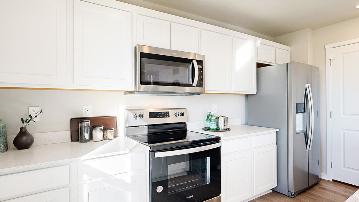Kitchen with stainless steel appliances.