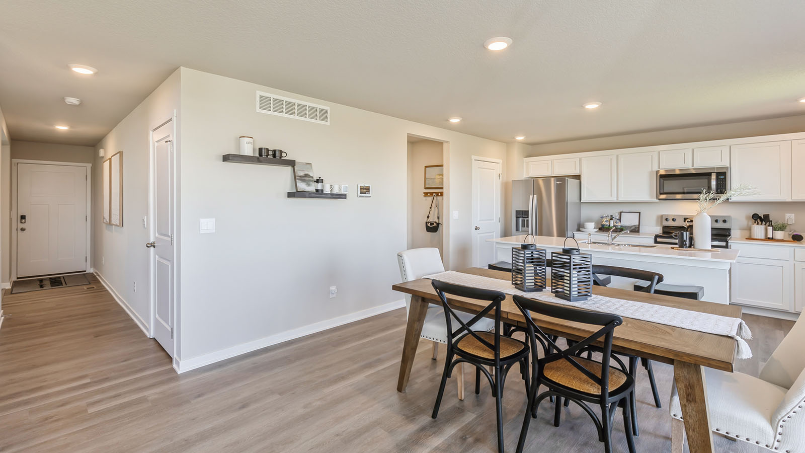Open concept dining space with access to backyard