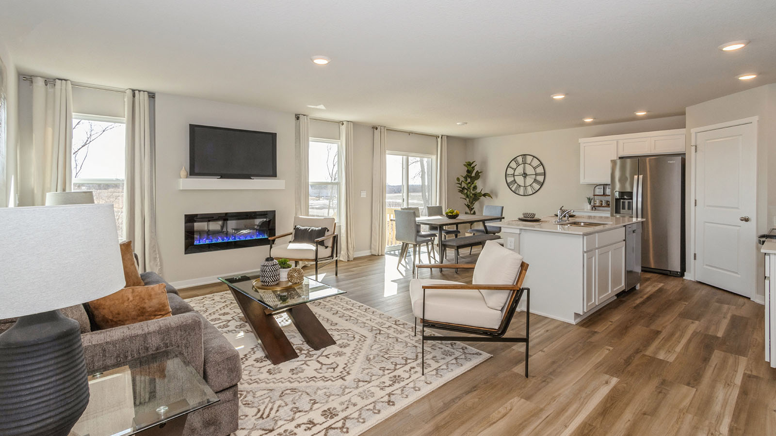 open concept living room and dining area and modern kitchen