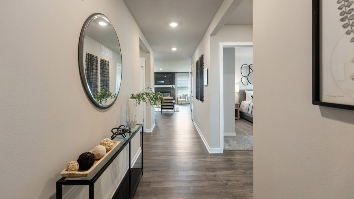 Comfortable secondary bedroom with natural light, modern finishes, and versatile living space.