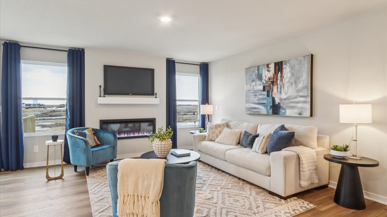 Open concept living room with electric fireplace